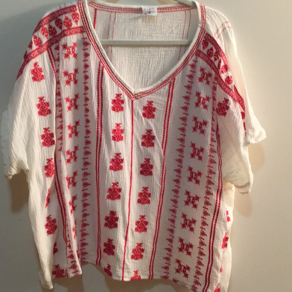 Cream and red top